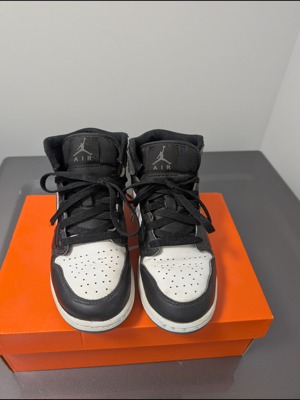Jordan Kids' Black and White High-Top Sneakers
